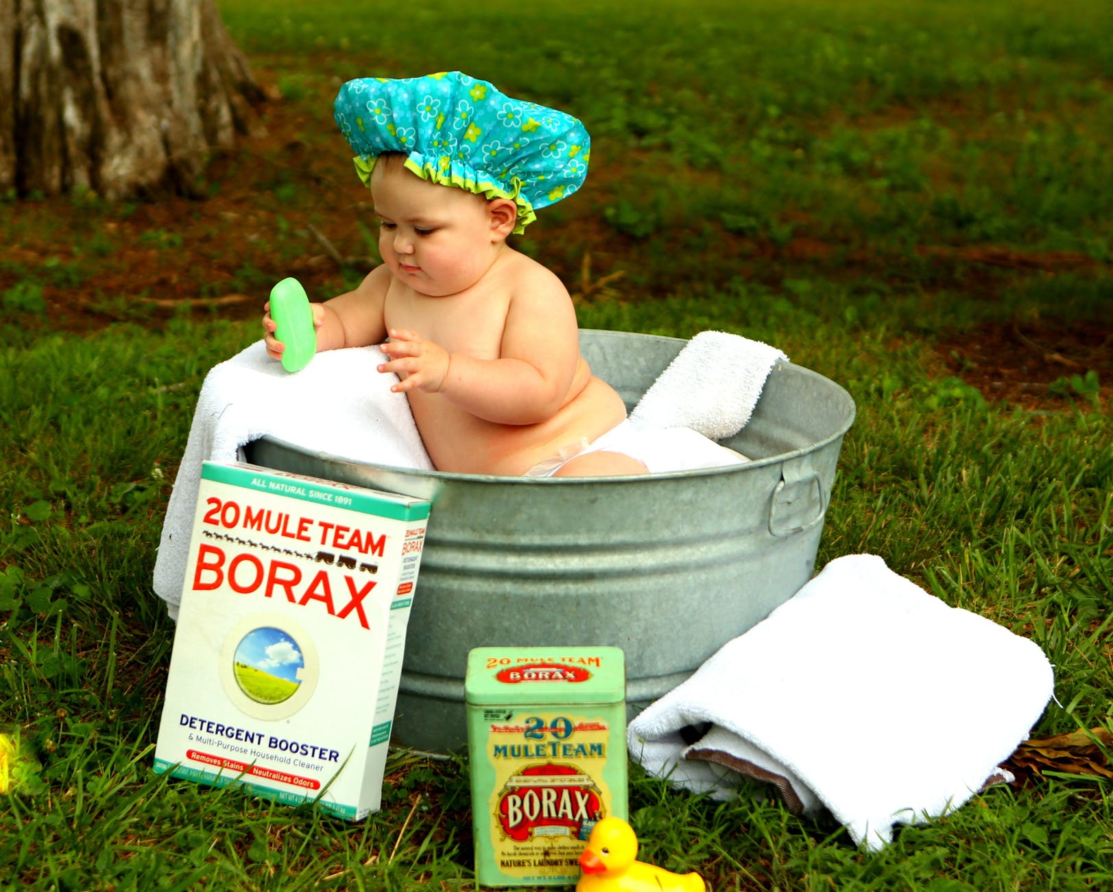 shirtless baby boy in galvanized tub